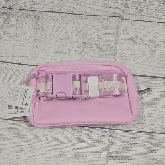 NWT Lululemon Everywhere Wordmark Crossbody Belt Bag 1L - Pink/White - Picture 2 of 5